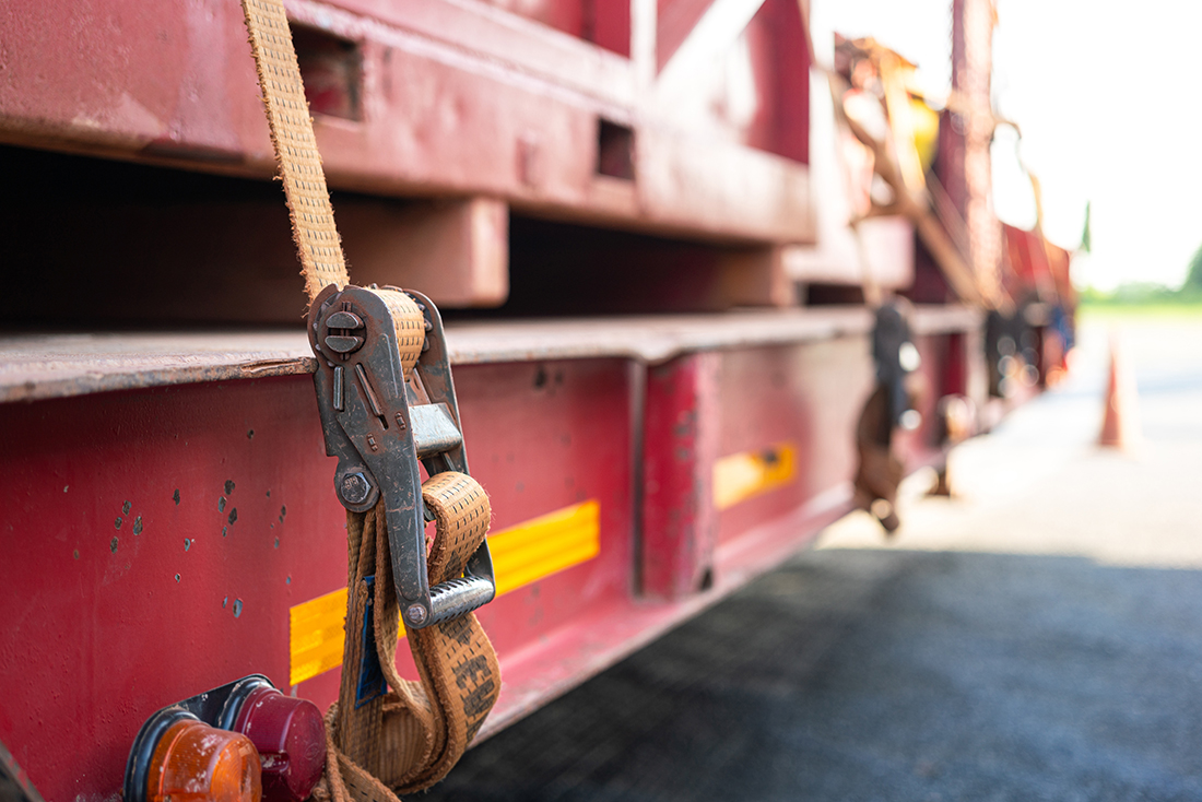 Machinery strapped for transportation.